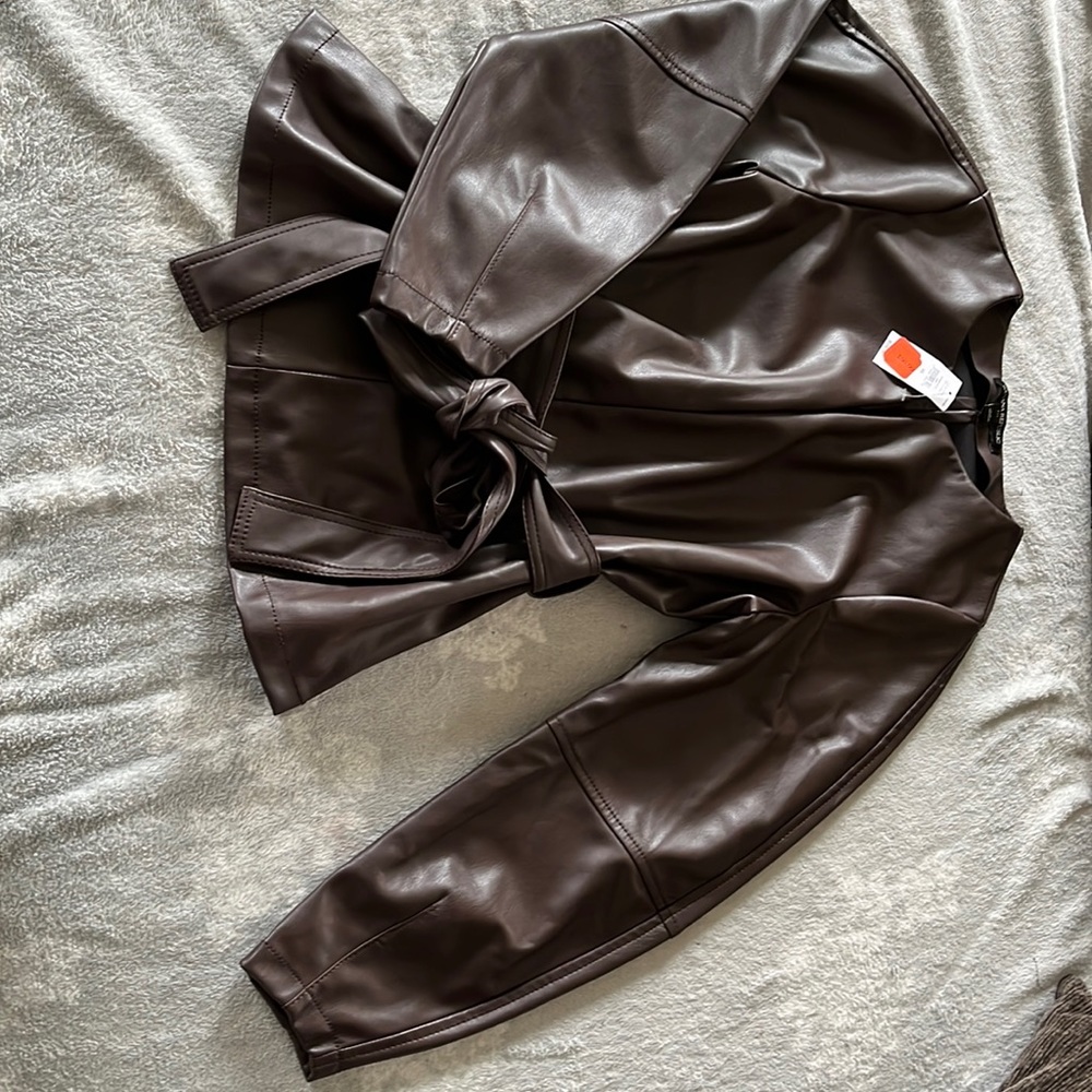 Brand new brown, long sleeve women’s shirt